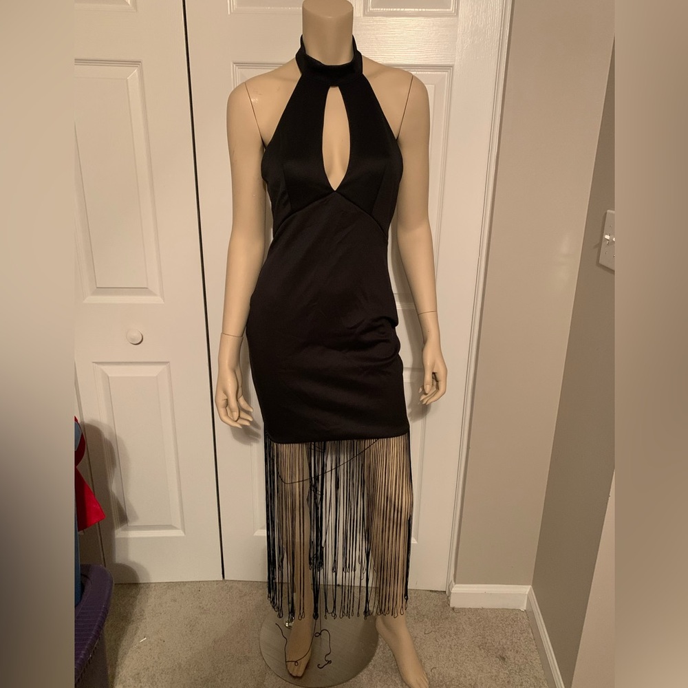 Black halter fringe dress.